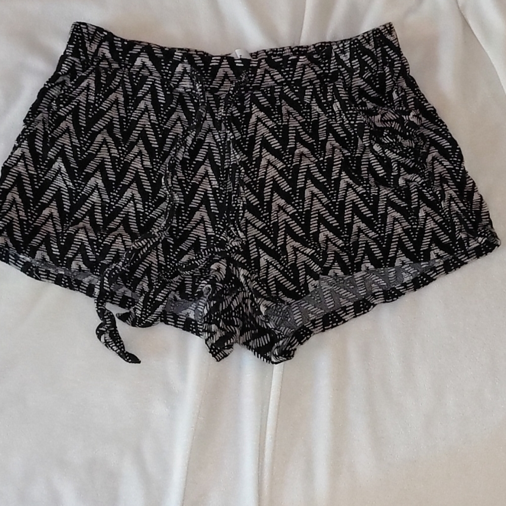 Tan and black shorts